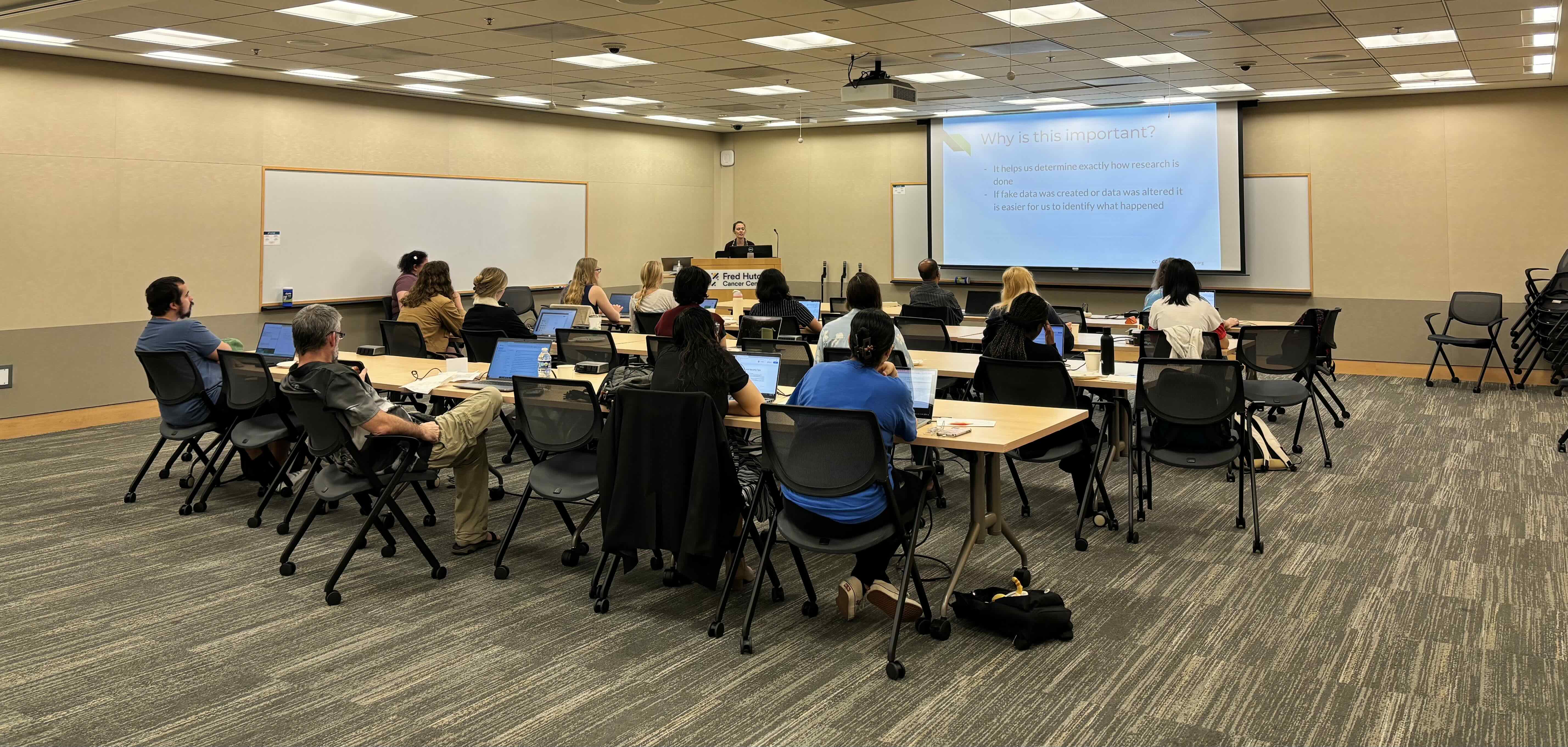 DaSEH participants in person in a classroom learning about reproducibility.